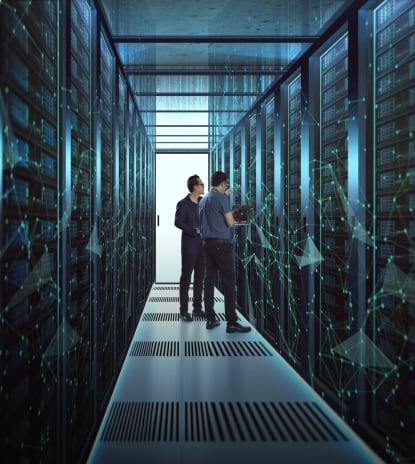 Two engineers in the data center